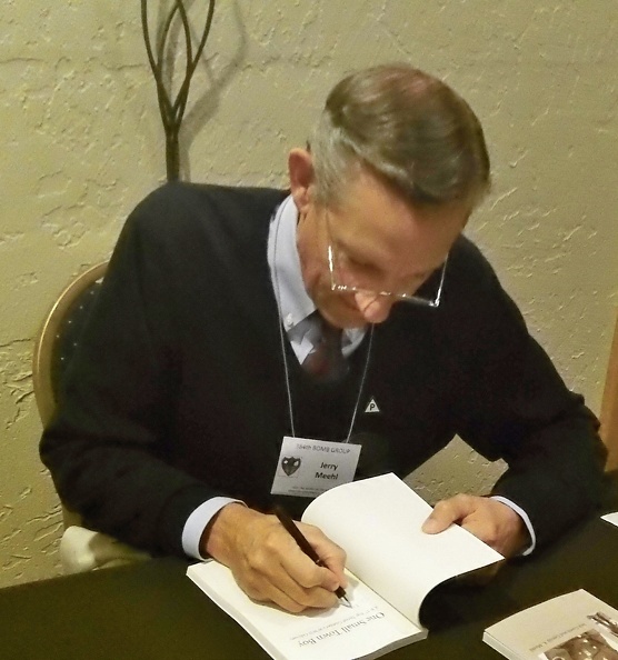 Mark signing Jack's book as Co-Author.JPG