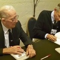 Jack Goetz and Jerry Meehl signing Jack's book