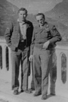Two unidentified enlisted men on bridge