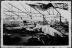Wrecked hangar and aircraft