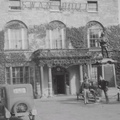 Swan Hotel with two men out front