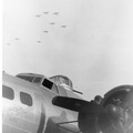 B17 on ground with formation in sky