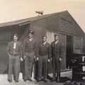 Albert Kenneth Taylor third from  left, other  three men unknown.jpg