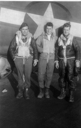 Hank Markow (on right) and two unidentified crewmembers.