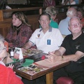 Sherry Wheeler, Horace Frink, and Carlton Phillips with wife Gladys across from him.