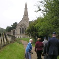 Nancy Braines greets us on our way to services at St James in Grafton Underwood.JPG
