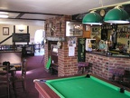 View past the bar and into the dining area in the Chequers.JPG