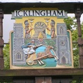 Icklingham sign near the thatched roof church, All Saints.JPG
