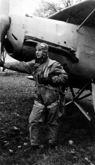 Student pilot in front of Arado Ar 66 C fighter trainer