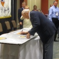 Henry Sienkiewicz signing the wing panel.