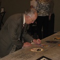 Peter Bielskis signing the wing panel.