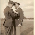 LTC William E. Buck presents a medal to William E.  Dolan