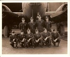 Britt Crew, unidentified B-17F in front of hangar