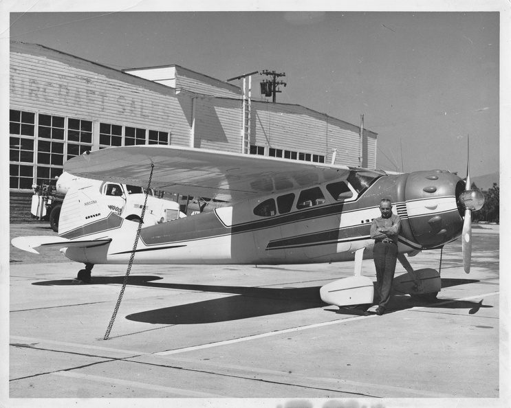 Budd Peaslee and Cessna 195, in front of Atwood Hangar.