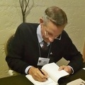 Jerry signing Jack's book as Co-Author