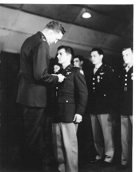 Russell M. Potts receiving the Distinguished Flying Cross from COL Dale O. SMith.png