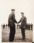 John S. Fox Jr. presented the Distinguished Flying Cross by Colonel Dale O. Smith.  24 July 1944.
