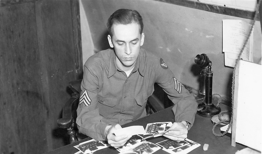 Sgt McKay Reviewing Aircrew Photos