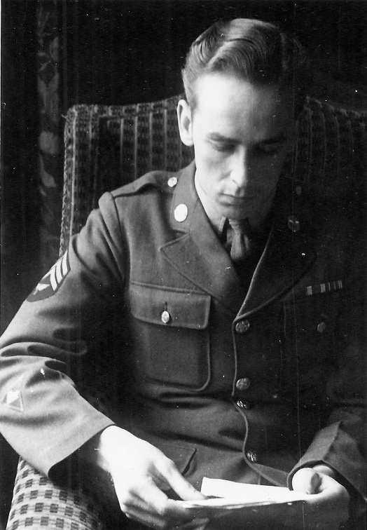 T/3 (Sgt) McKay Reading a Letter