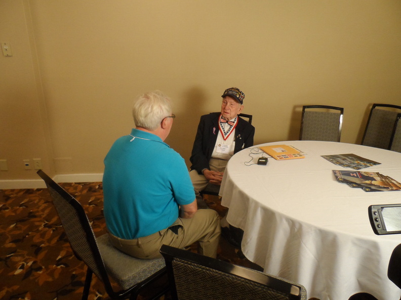 Dewey Holst, 466th Bomb Group - being interviewed.JPG