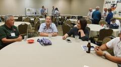 Swapping Stories in the Hospitality Room