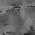 B-17 formation in flight over clouds