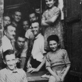 Olivo family with Stalnaker's crew in the barn, 1944