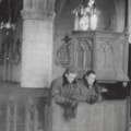 Two Men Praying in Church
