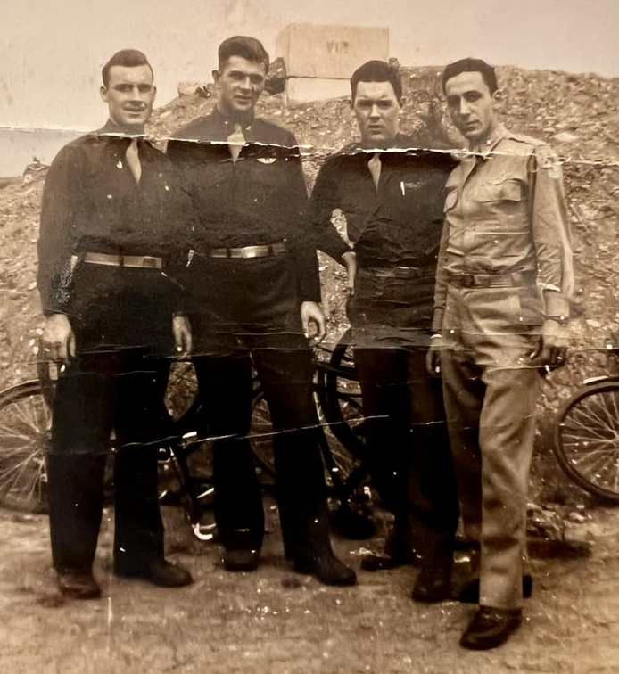 4 men, Andy Volpini on the right.