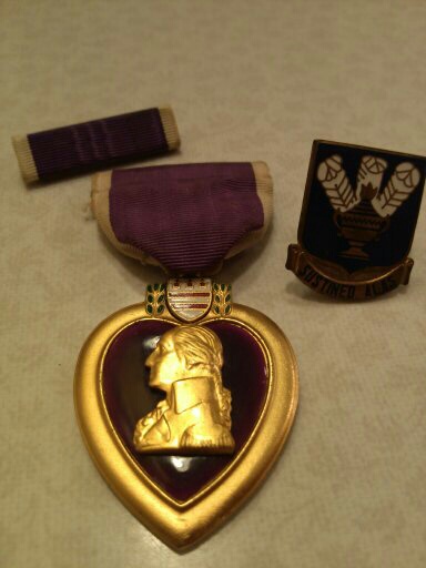 Charles Eyre purple heart ribbon and medal and service insignia.jpg